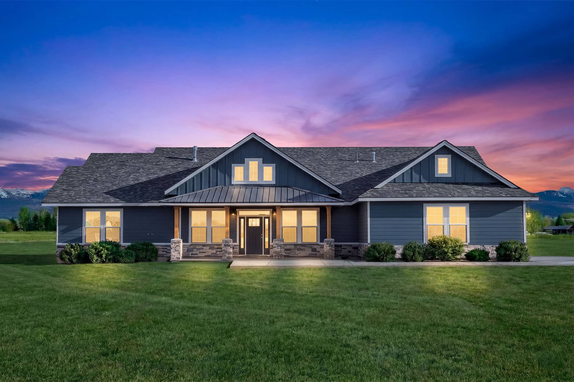 Large suburban house exterior at twilight after day-to-dusk editing